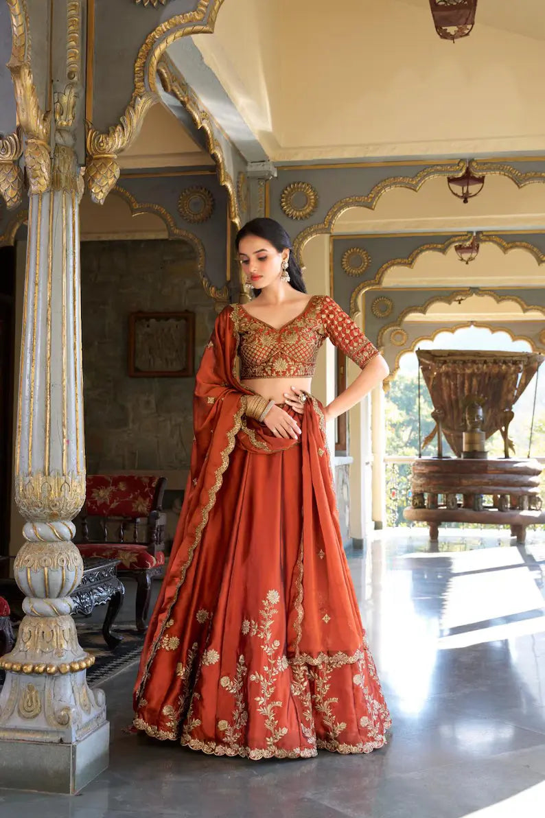 Orange Color Wedding Wear Rangoli Silk Lehenga Choli