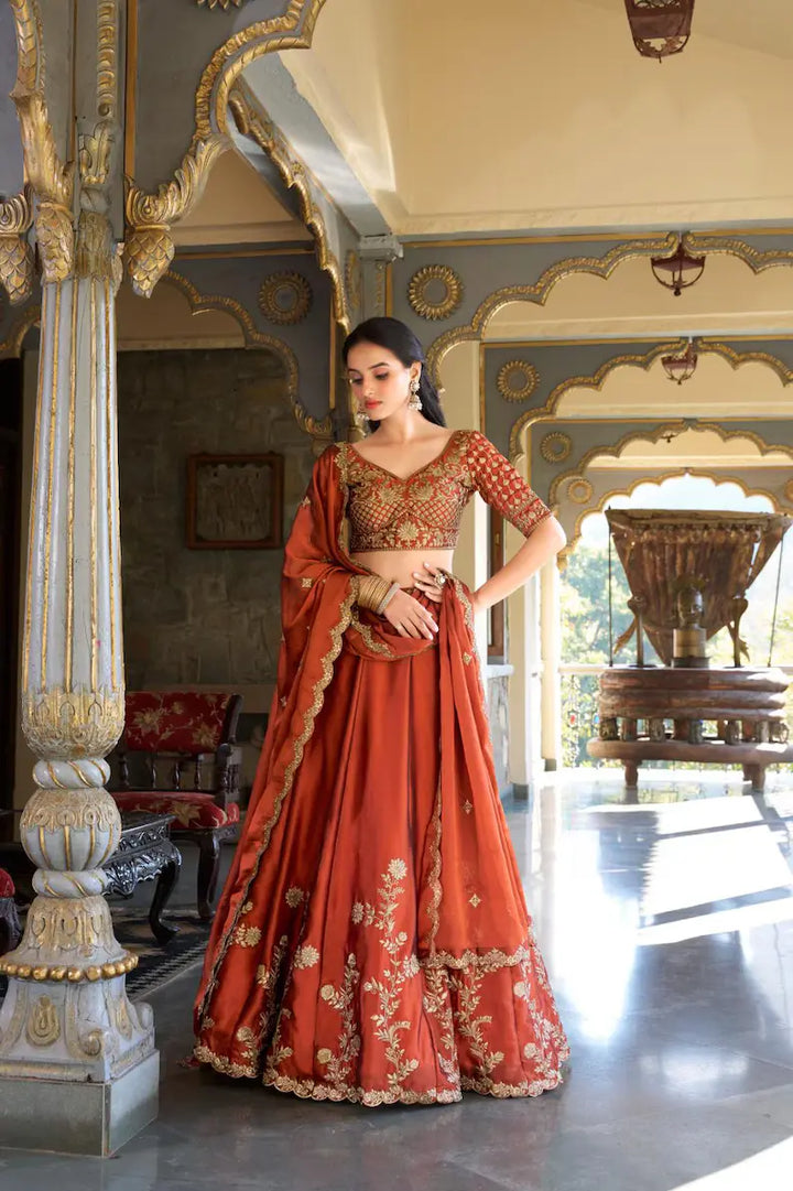 Orange Color Wedding Wear Rangoli Silk Lehenga Choli