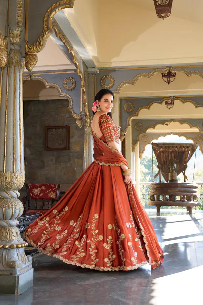 Orange Color Wedding Wear Rangoli Silk Lehenga Choli