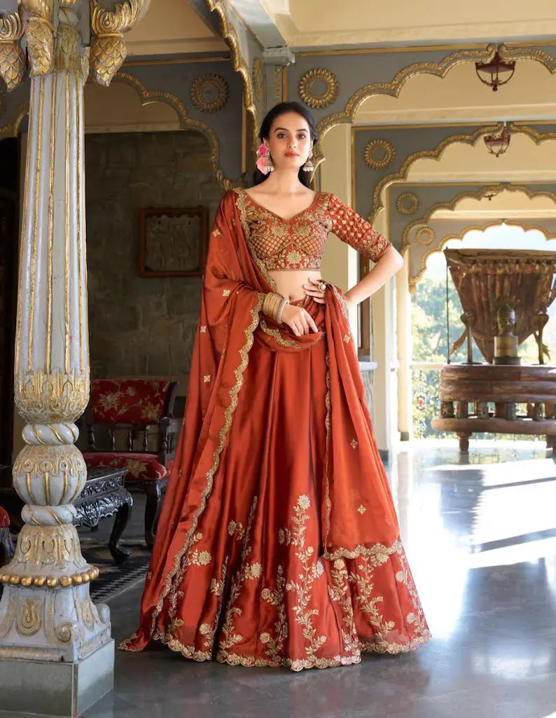 Orange Color Wedding Wear Rangoli Silk Lehenga Choli